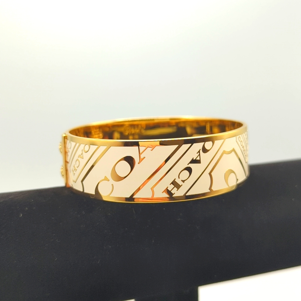 Nothing lower - Coach Bangle Bracelet White Enamel Signature Goldtone.  NWOT